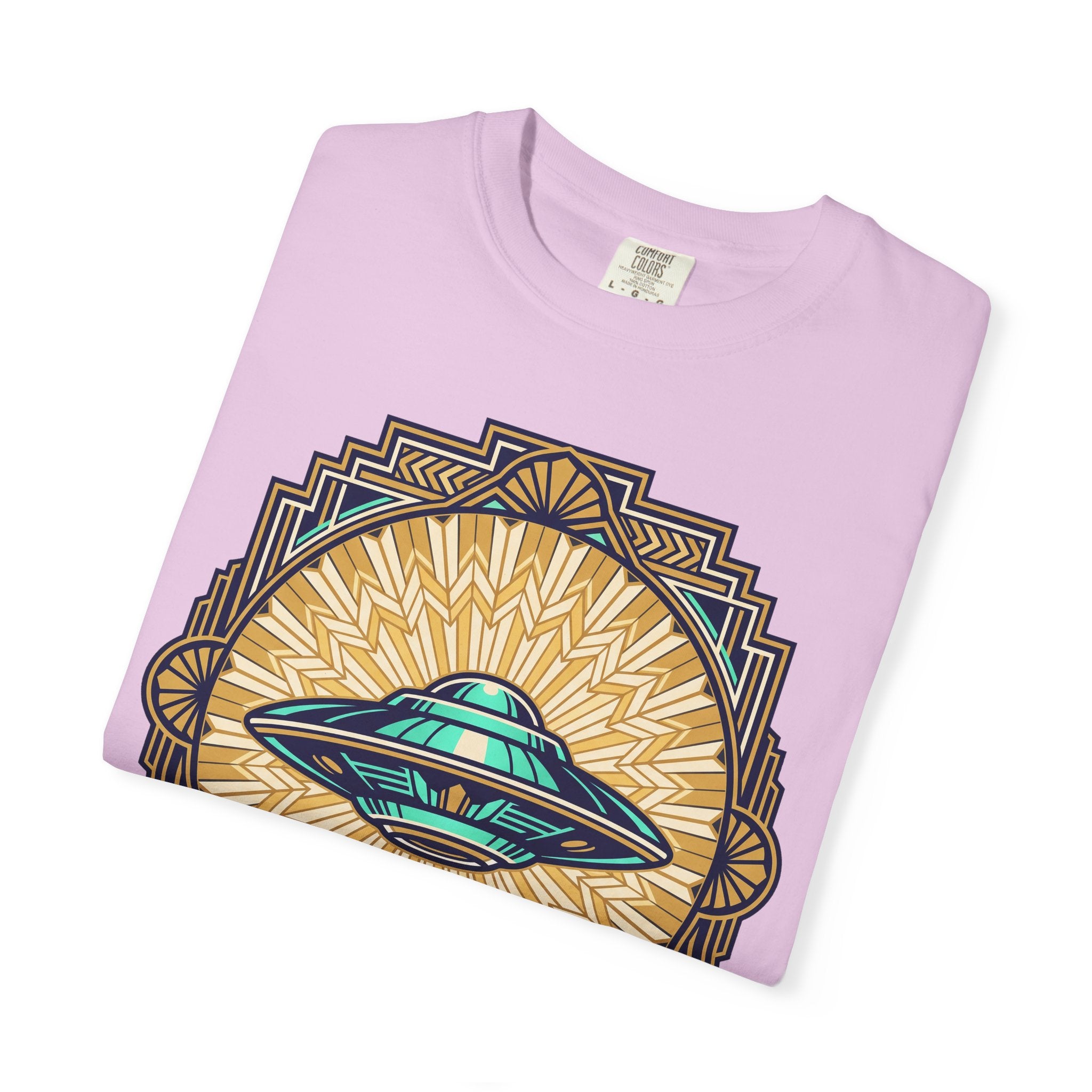 Lavender UFO graphic T-shirt close-up with teal saucer over sunburst