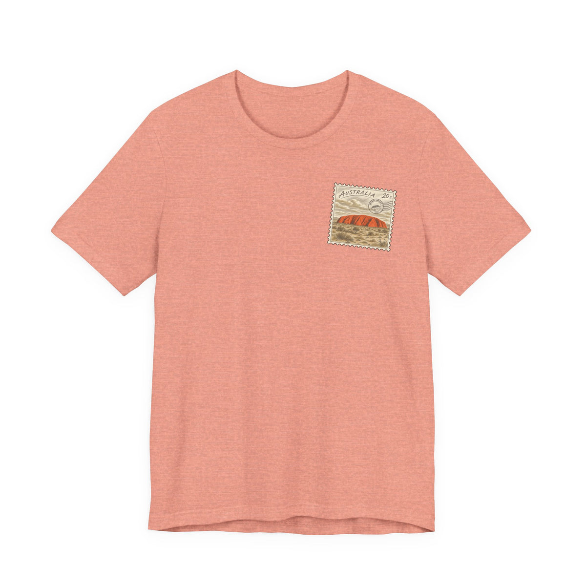 Salmon pink t-shirt with small vintage postage-stamp style graphic on the chest