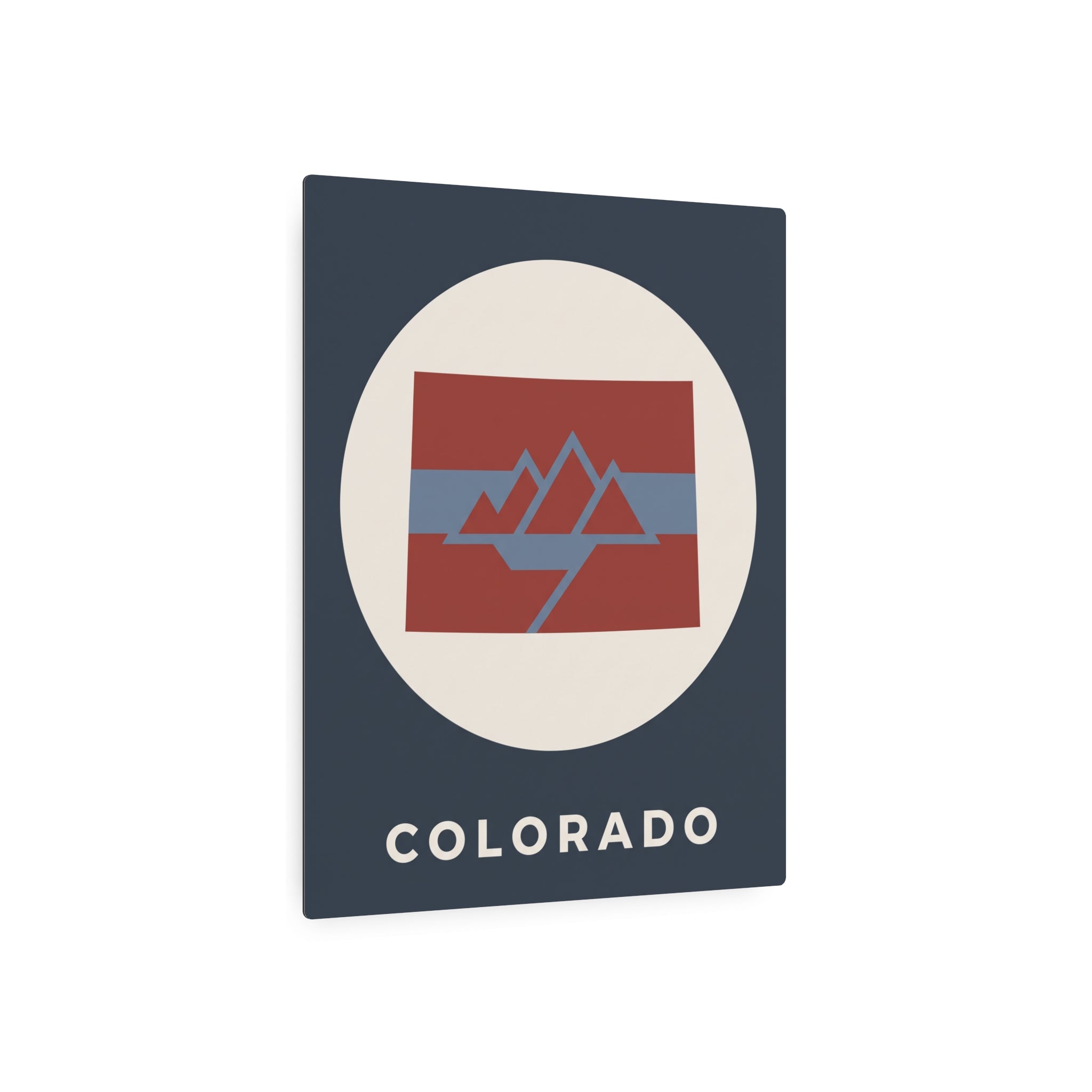 Colorado metal art sign with cream circle, red-blue mountain flag graphic and “COLORADO”