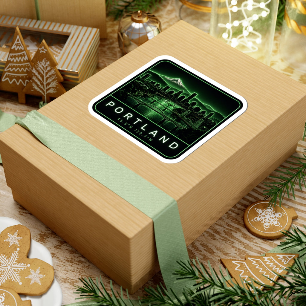 Portland skyline sticker on wrapped gift, neon green skyline with PORTLAND text and coords