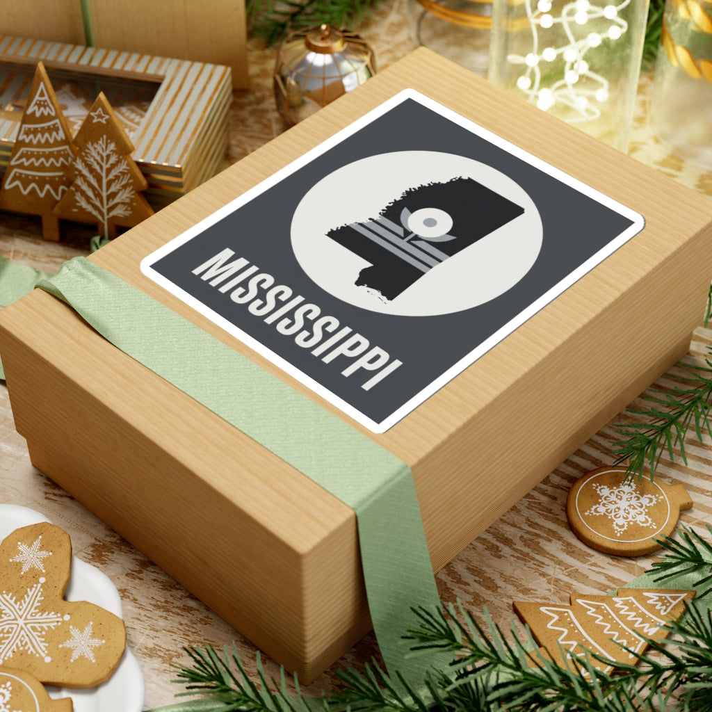 Mississippi silhouette sticker on gift box, circular emblem with “MISSISSIPPI”