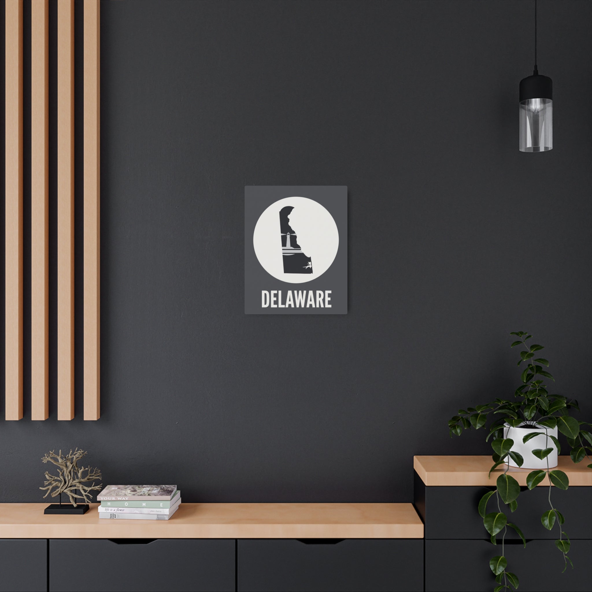 Square dark metal wall sign with circular lighthouse silhouette and DELAWARE lettering