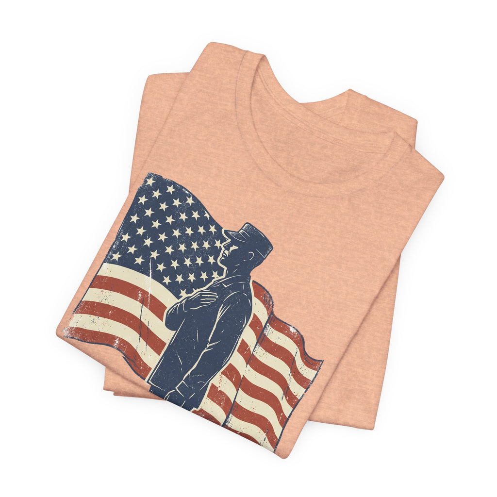 Peach T-shirt with saluting soldier graphic and American flag design on front