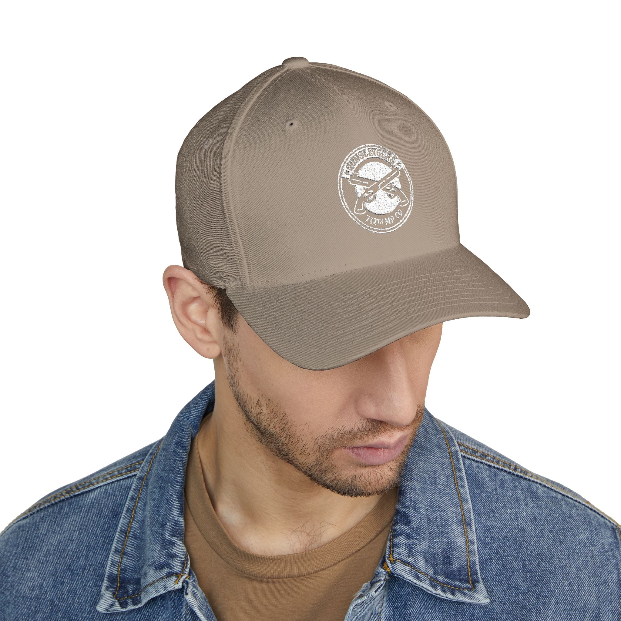 Olive baseball cap with circular white embroidered emblem on front