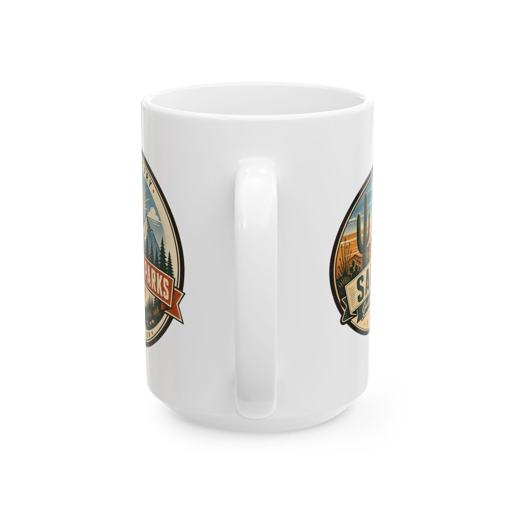 White ceramic coffee mug with two side badge prints and central handle