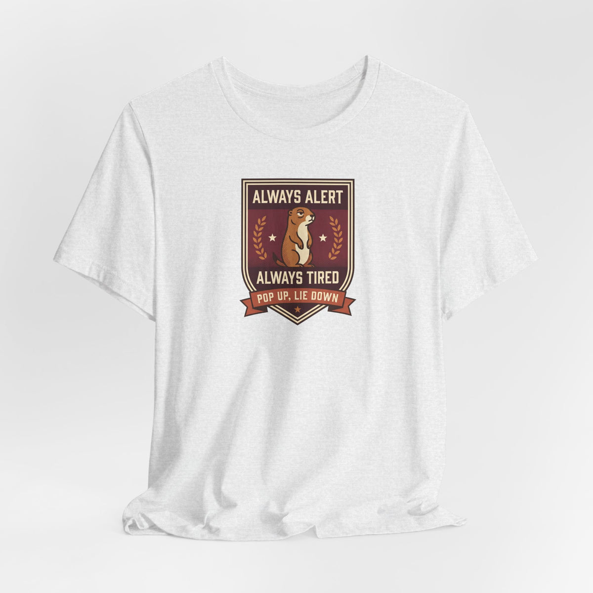 White crewneck T-shirt with brown squirrel crest badge graphic on chest, folded