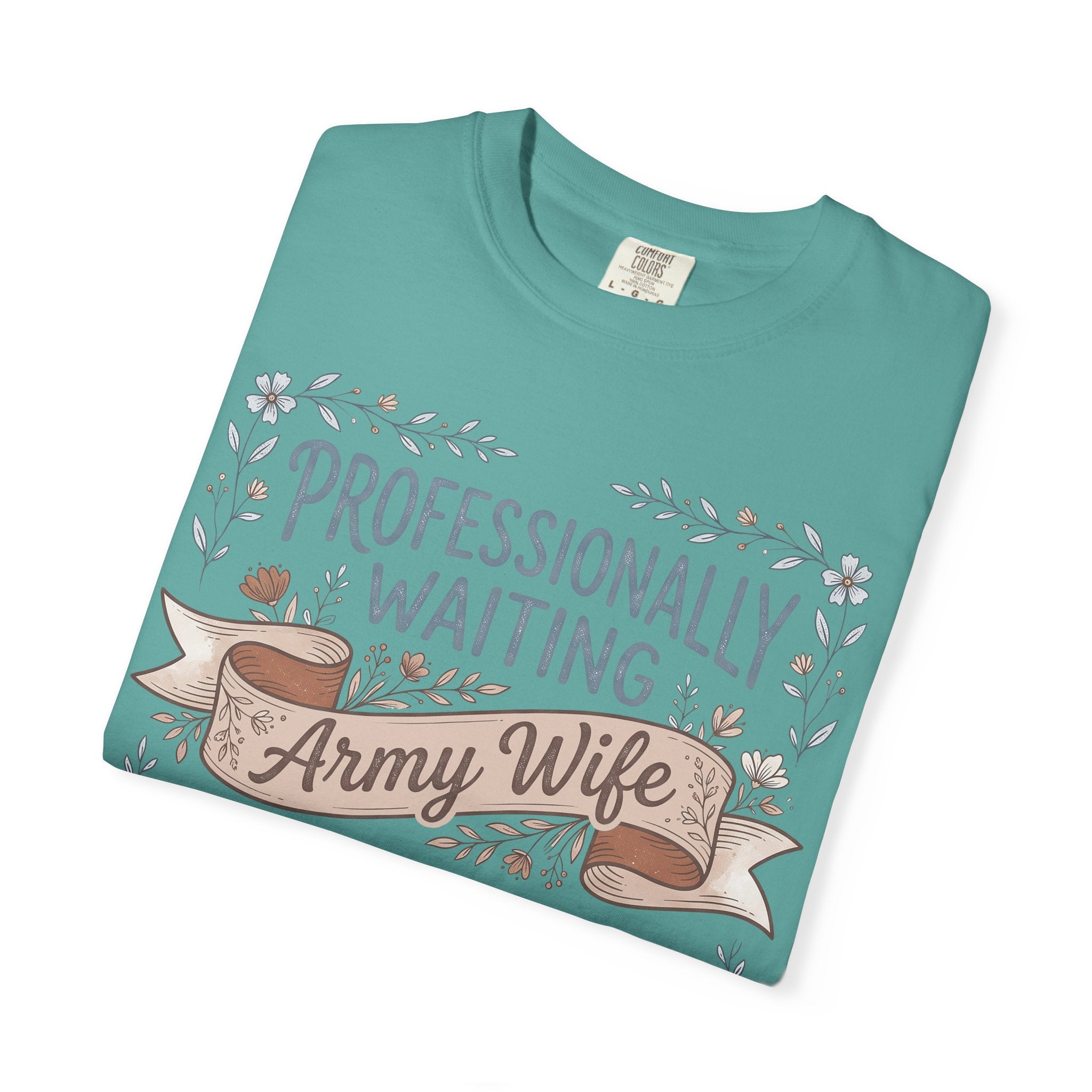 Teal folded crewneck t-shirt with floral ribbon and “Army Wife” text graphic