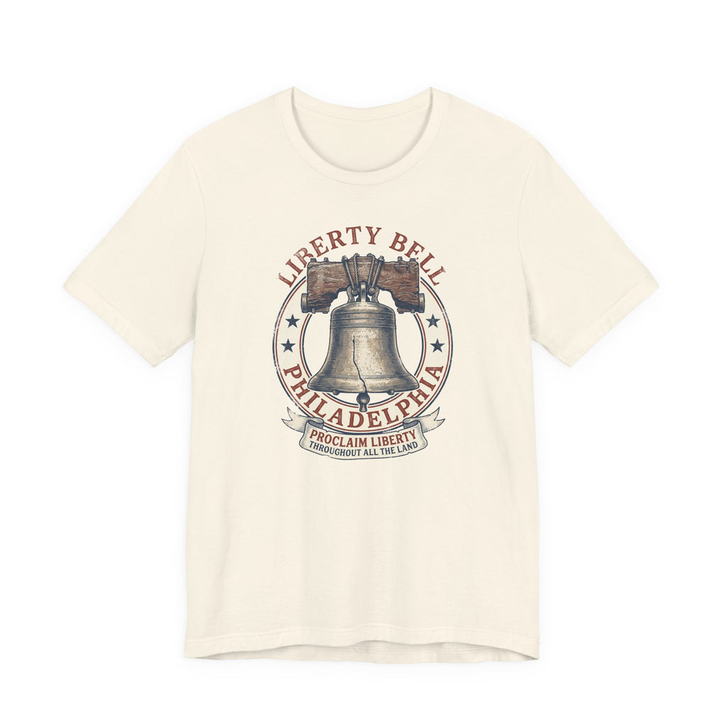 Light cream T-shirt with Liberty Bell graphic emblem at center chest