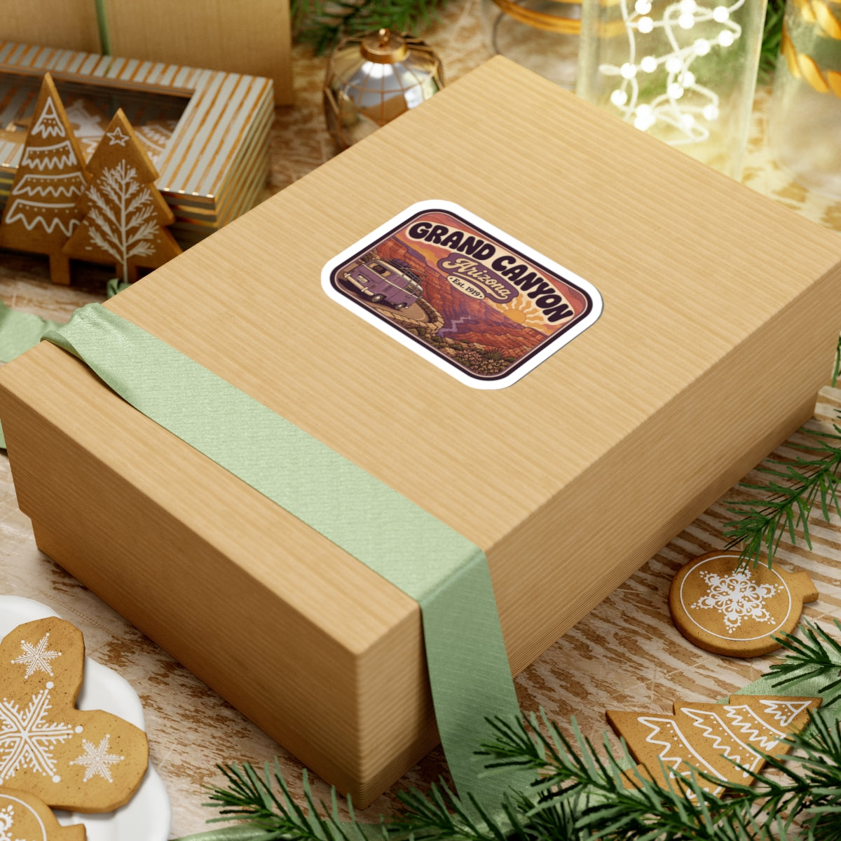 Grand Canyon sticker on wrapped gift box, vintage canyon scene with purple camper van