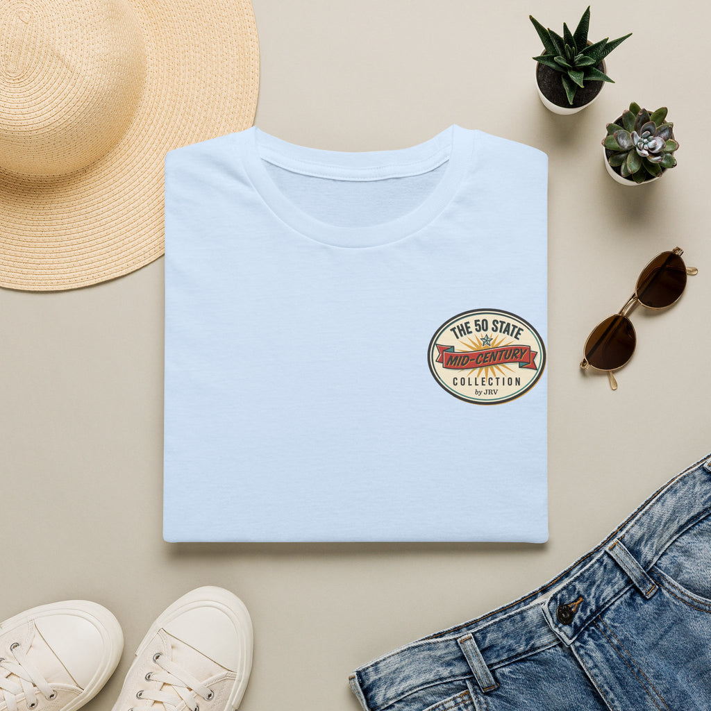 Light blue crewneck T-shirt with a round chest logo patch.