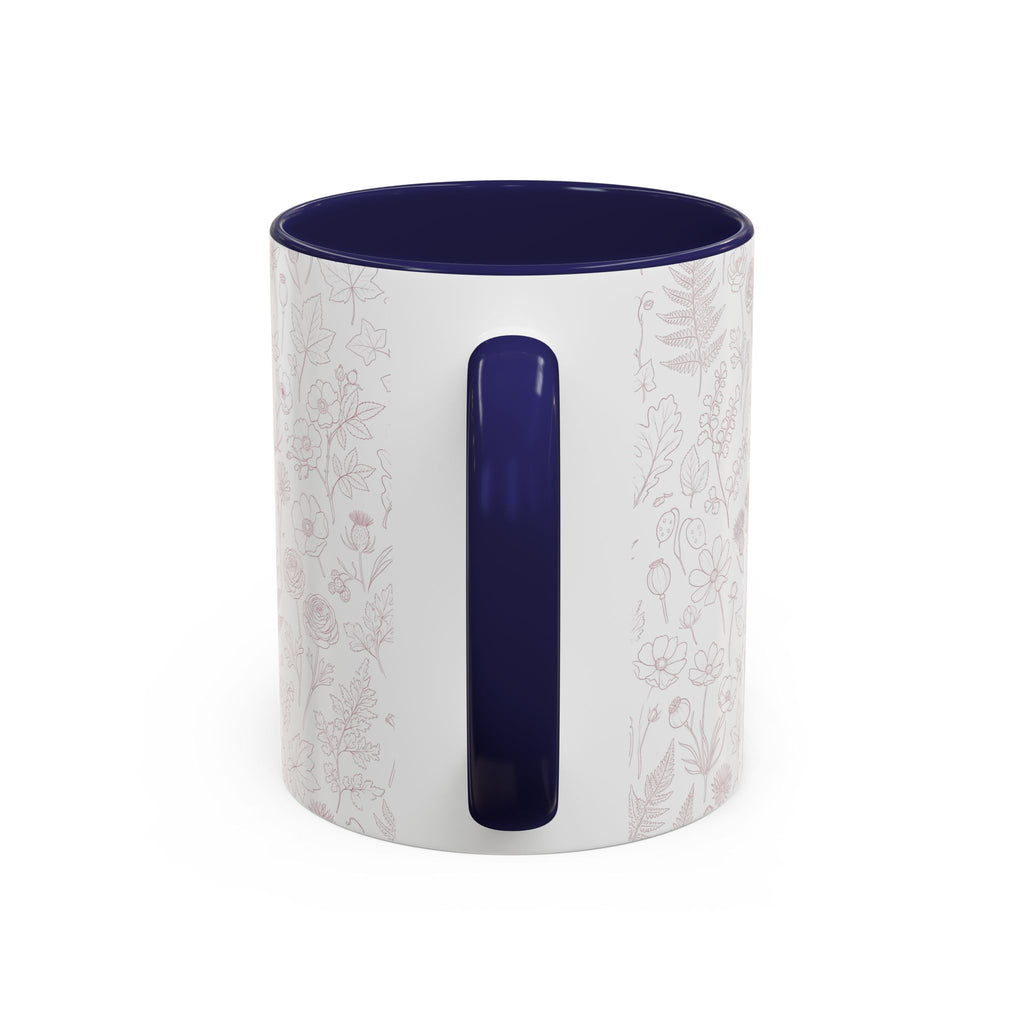 Floral patterned ceramic mug, white with blush wildflower print and navy interior accent