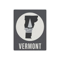 Square Vermont metal wall art with circular pine-tree silhouette and “VERMONT” text.
