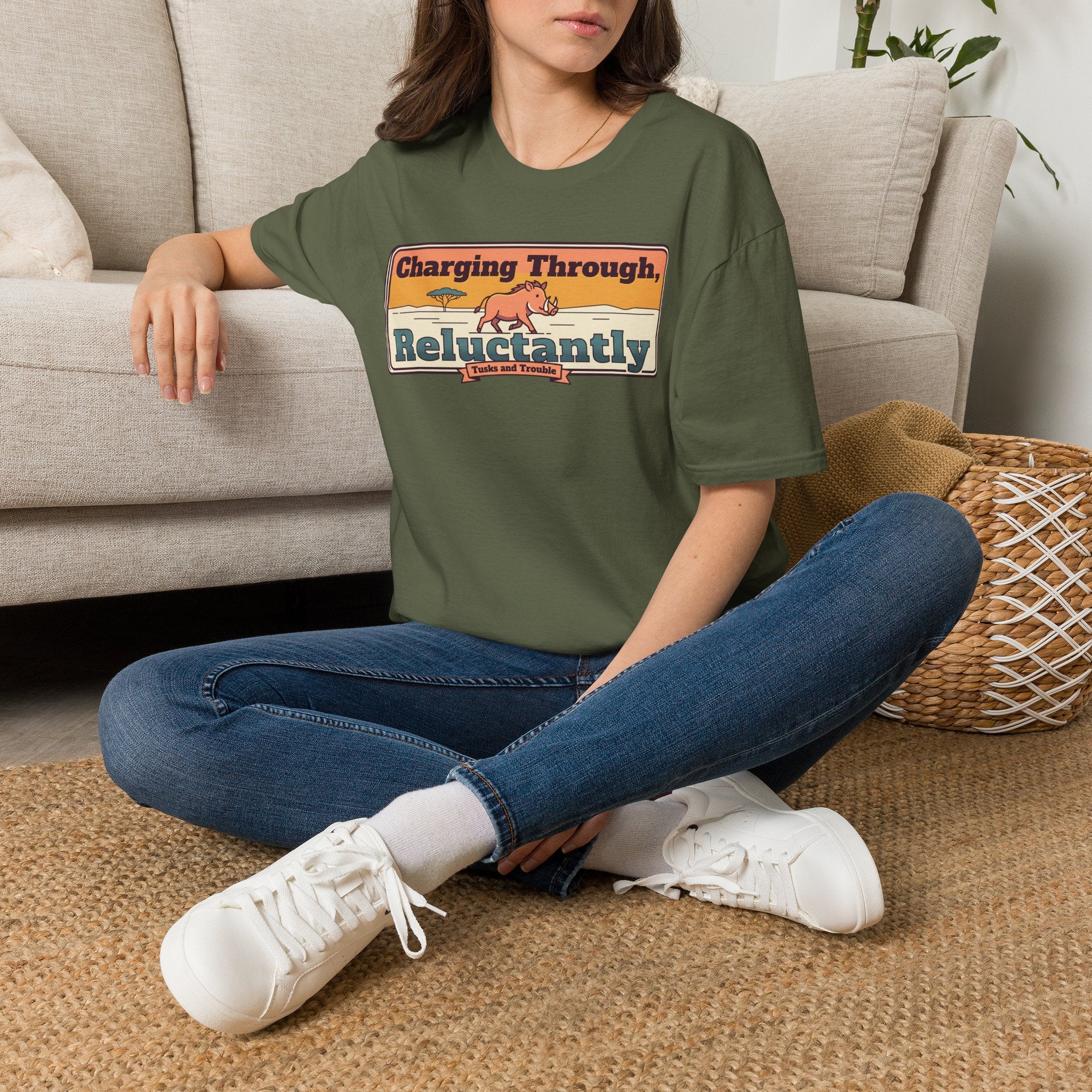 Military green T-shirt with charging-through and reluctantly graphic on the front
