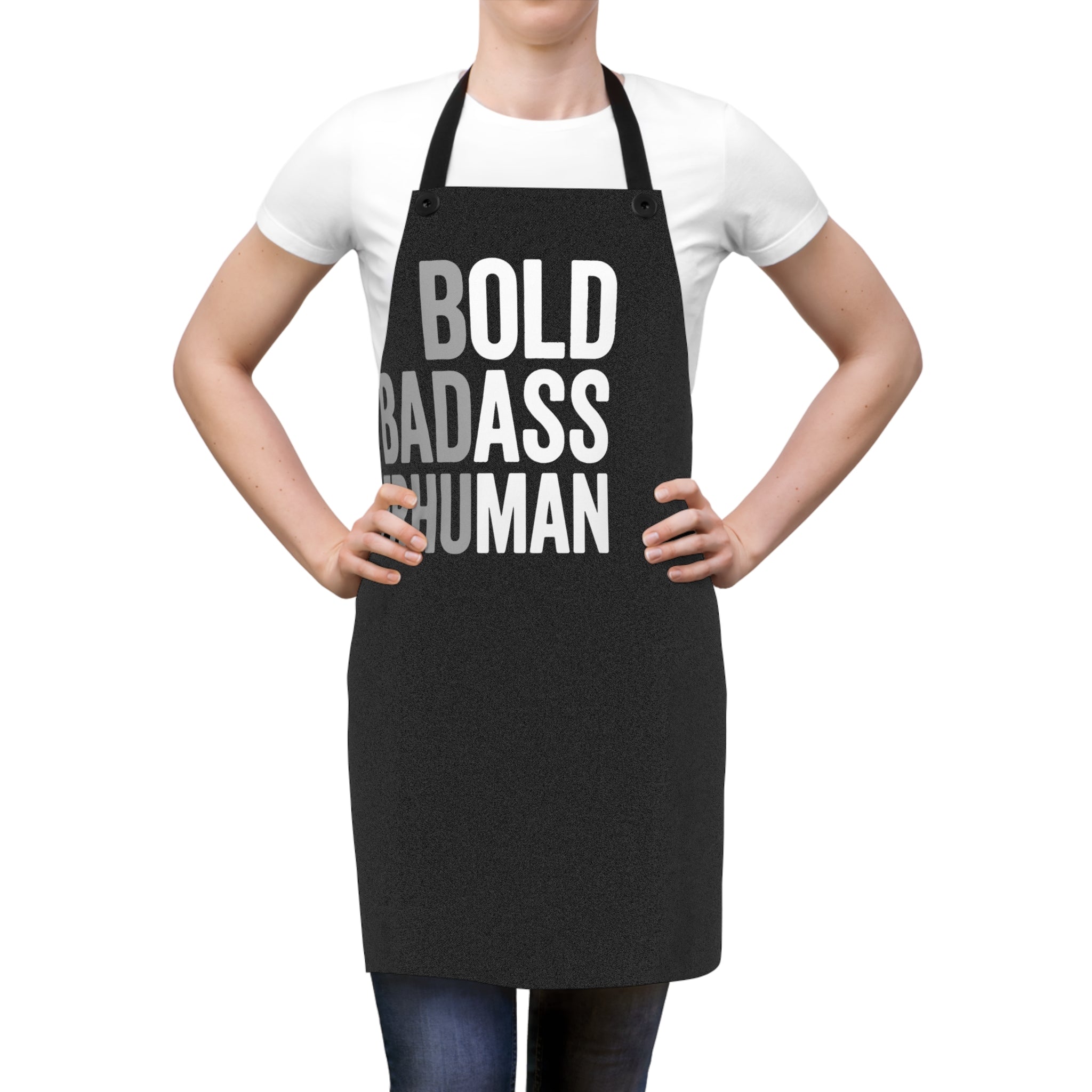 Black apron over white T-shirt with 'BOLD BADASS SUPERHUMAN' text and straps