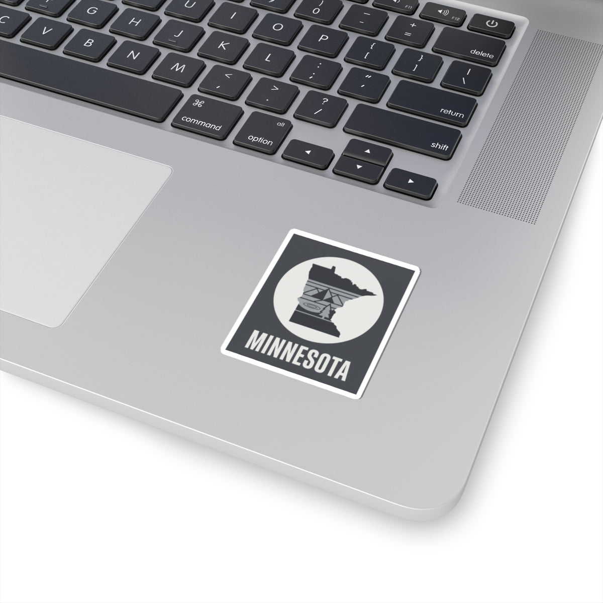 Minnesota state silhouette kiss-cut sticker, square border with dark capitol icon and MINNESOTA text