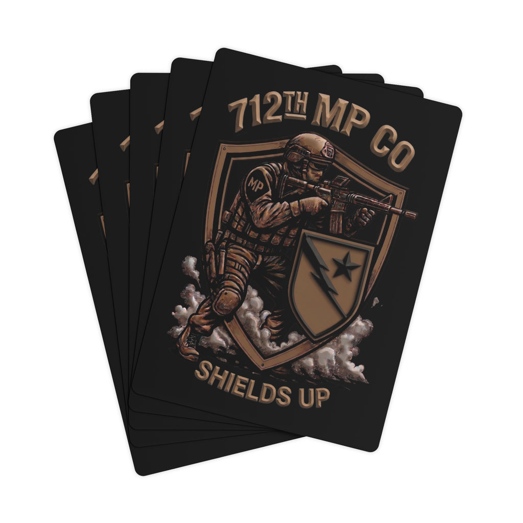 Poker cards fanned with 712th MP Co Shields Up logo and shield illustration