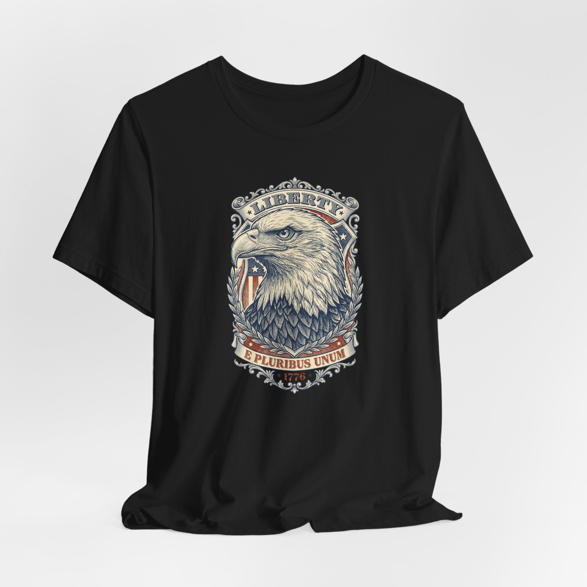 Black crew-neck graphic tee with bald eagle head and “E Pluribus Unum” text