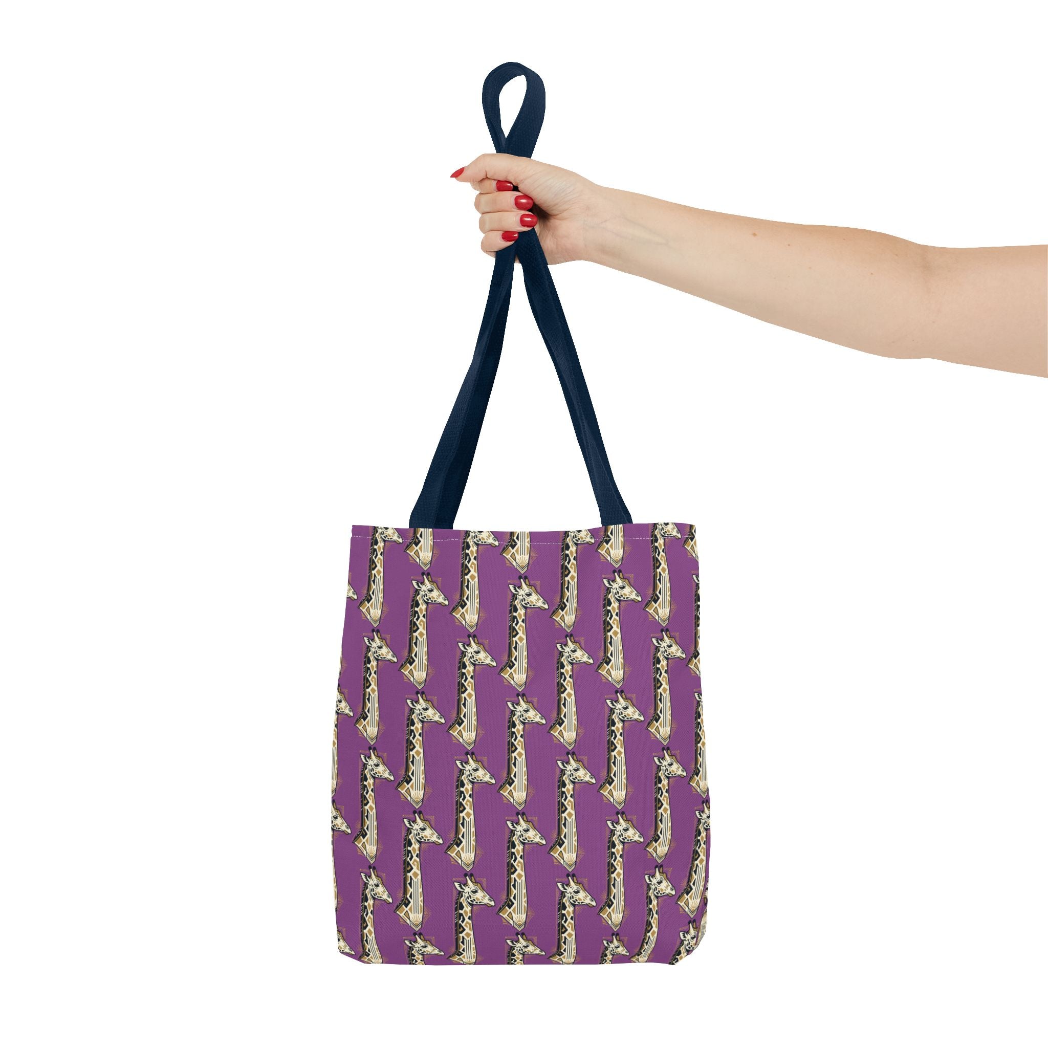 Purple tote bag with saxophone pattern and navy top handles, held up by handle.