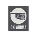 Oklahoma wall metal art sign with white circle oil rig graphic and OKLAHOMA text