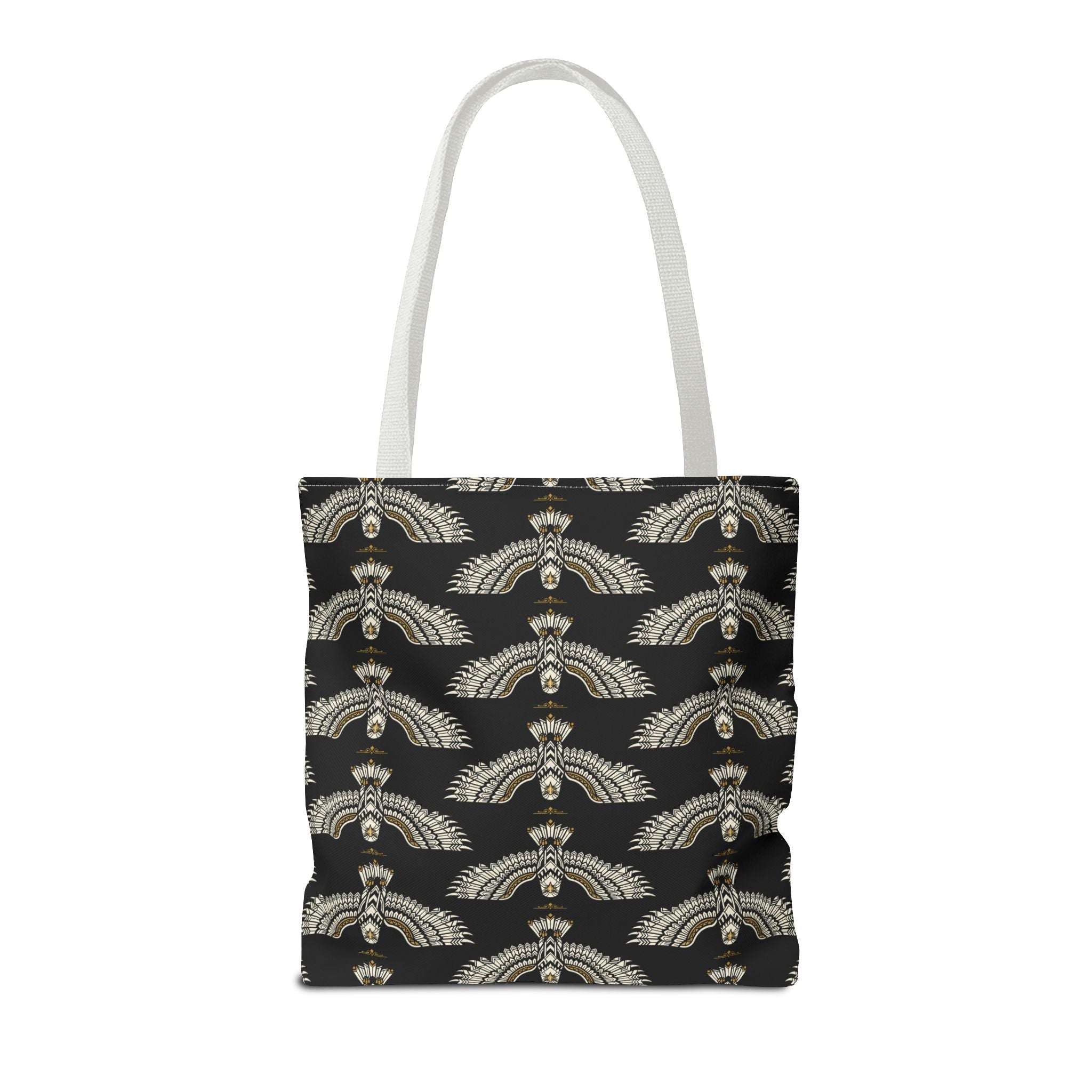 Tote bag front view with black base and repeating winged scarab design, white handles