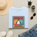 Light blue crew-neck T-shirt with retro penguin badge graphic and “Formally” “Exhausted” text.