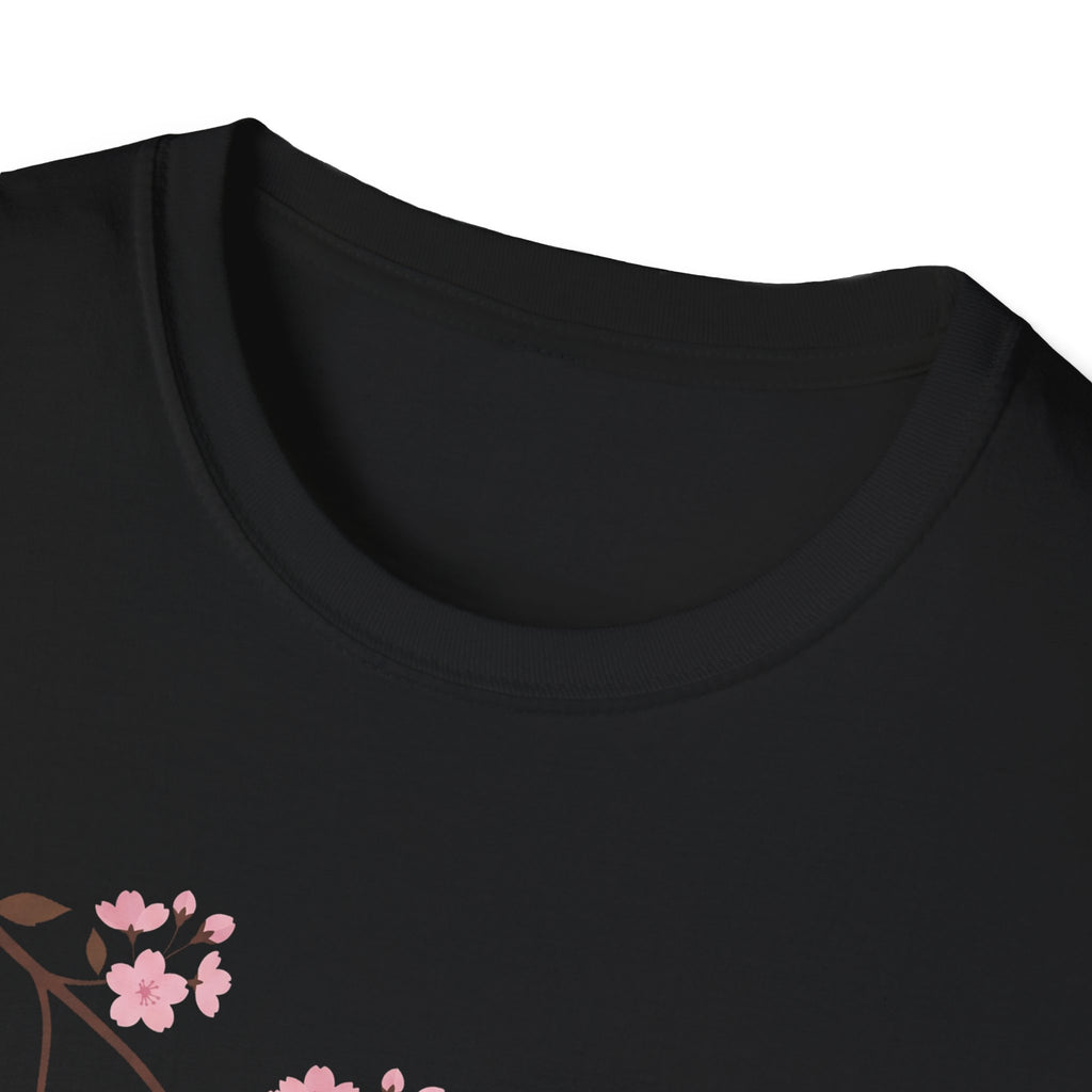 Black T-shirt neckline with partial pink cherry blossom branch graphic