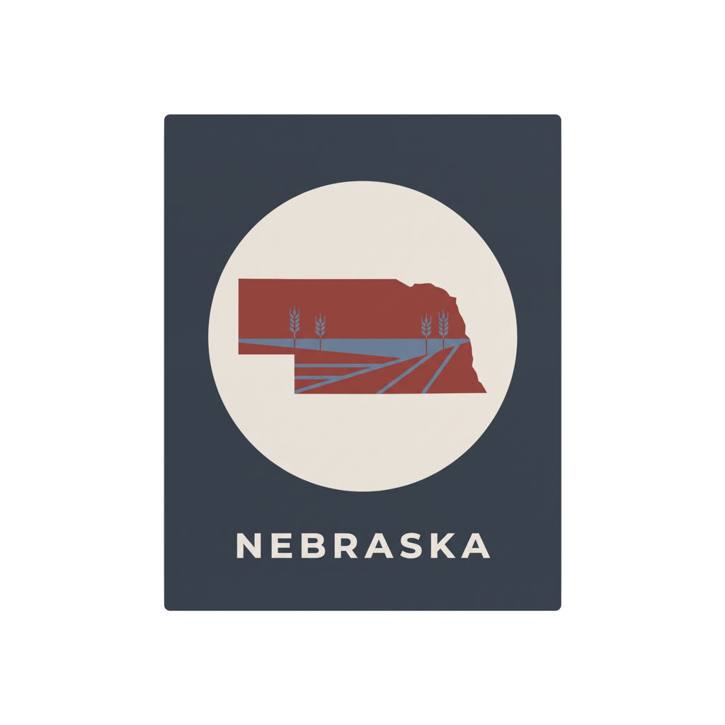 Nebraska state metal wall art sign, dark background with circular farm graphic and “NEBRASKA”