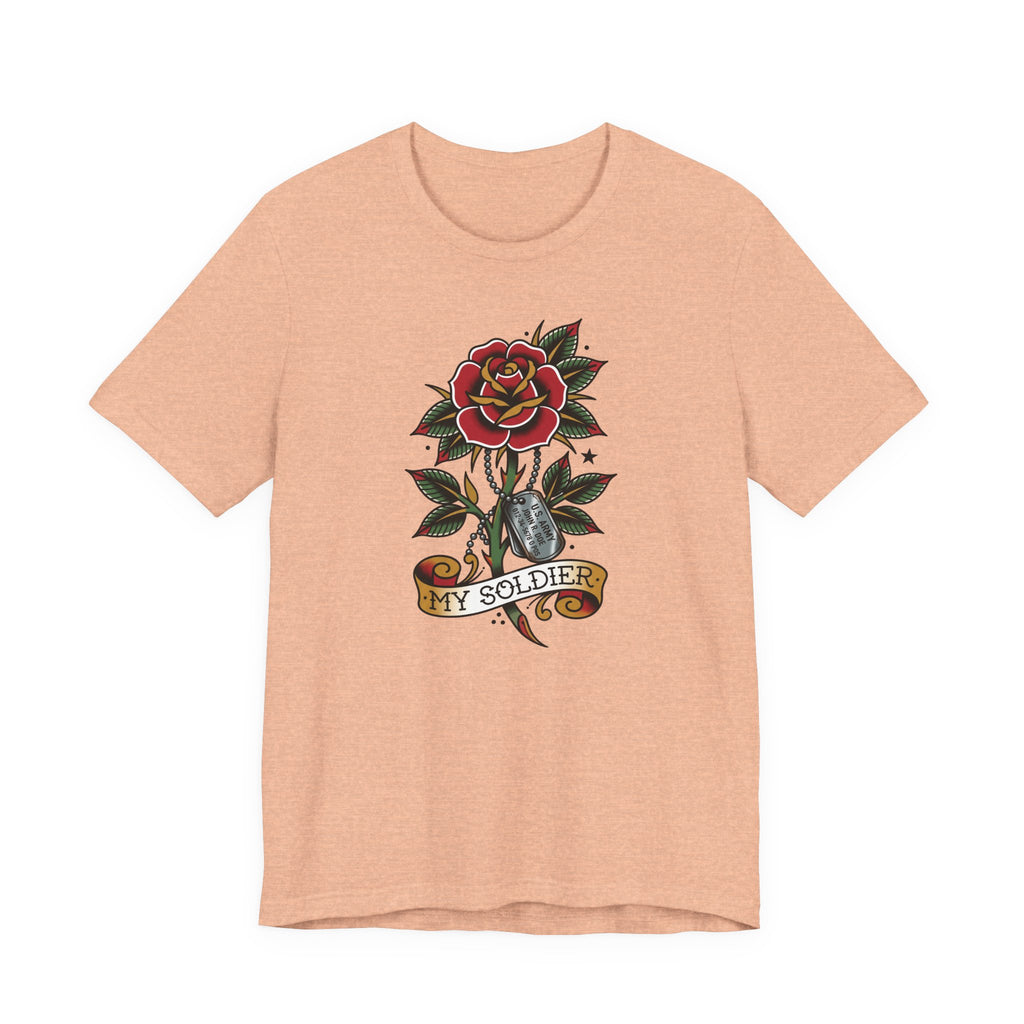 Tan peach crew-neck T-shirt with rose and dog tags graphic at center
