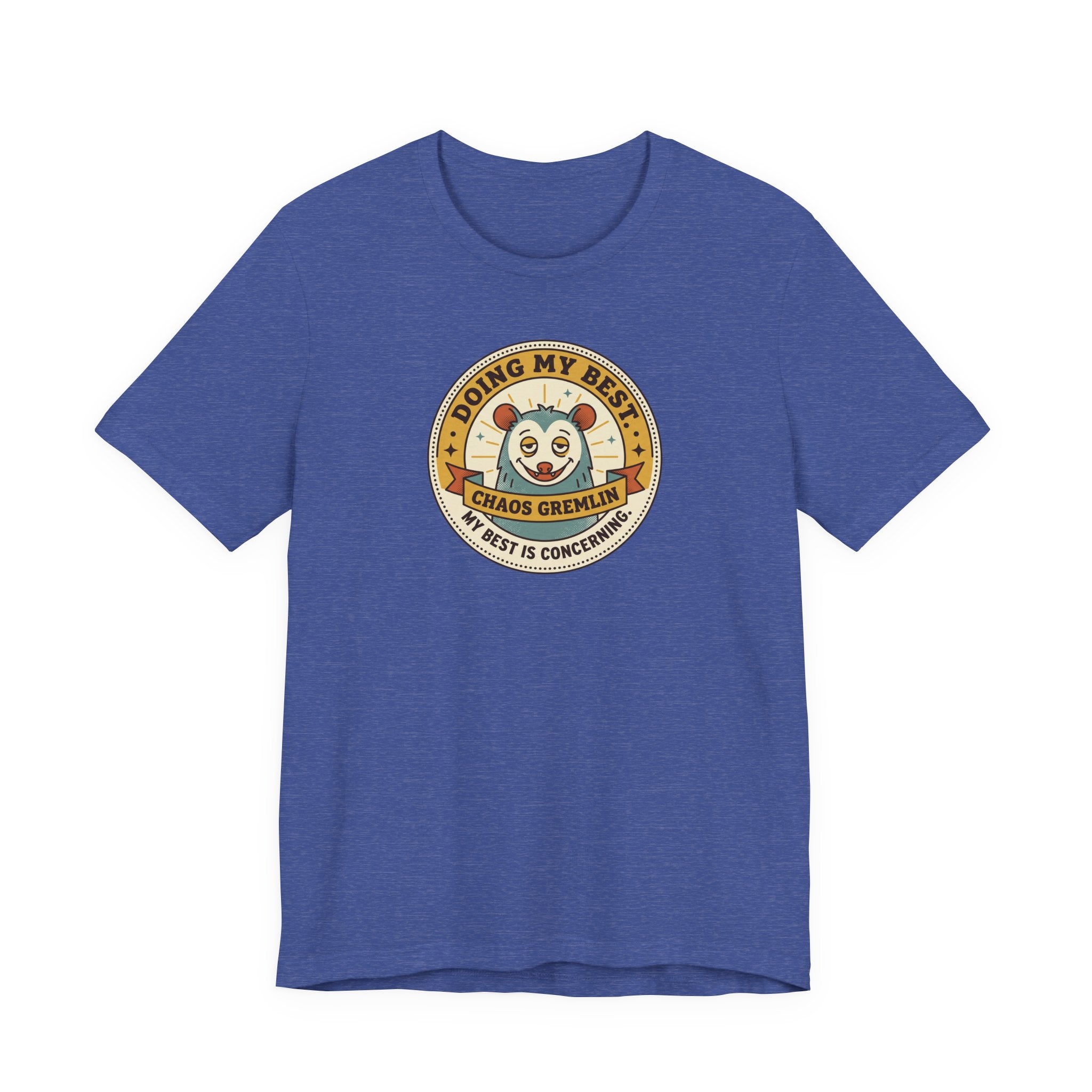 Blue T-shirt with round gremlin badge graphic on center chest