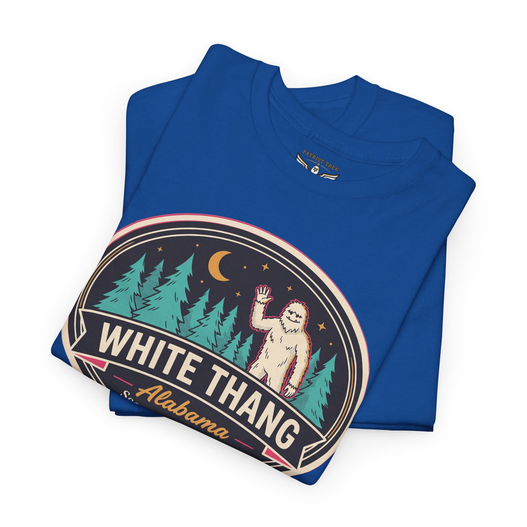 Royal blue graphic patch tee with 'White Thang' badge and pine-sasquatch artwork