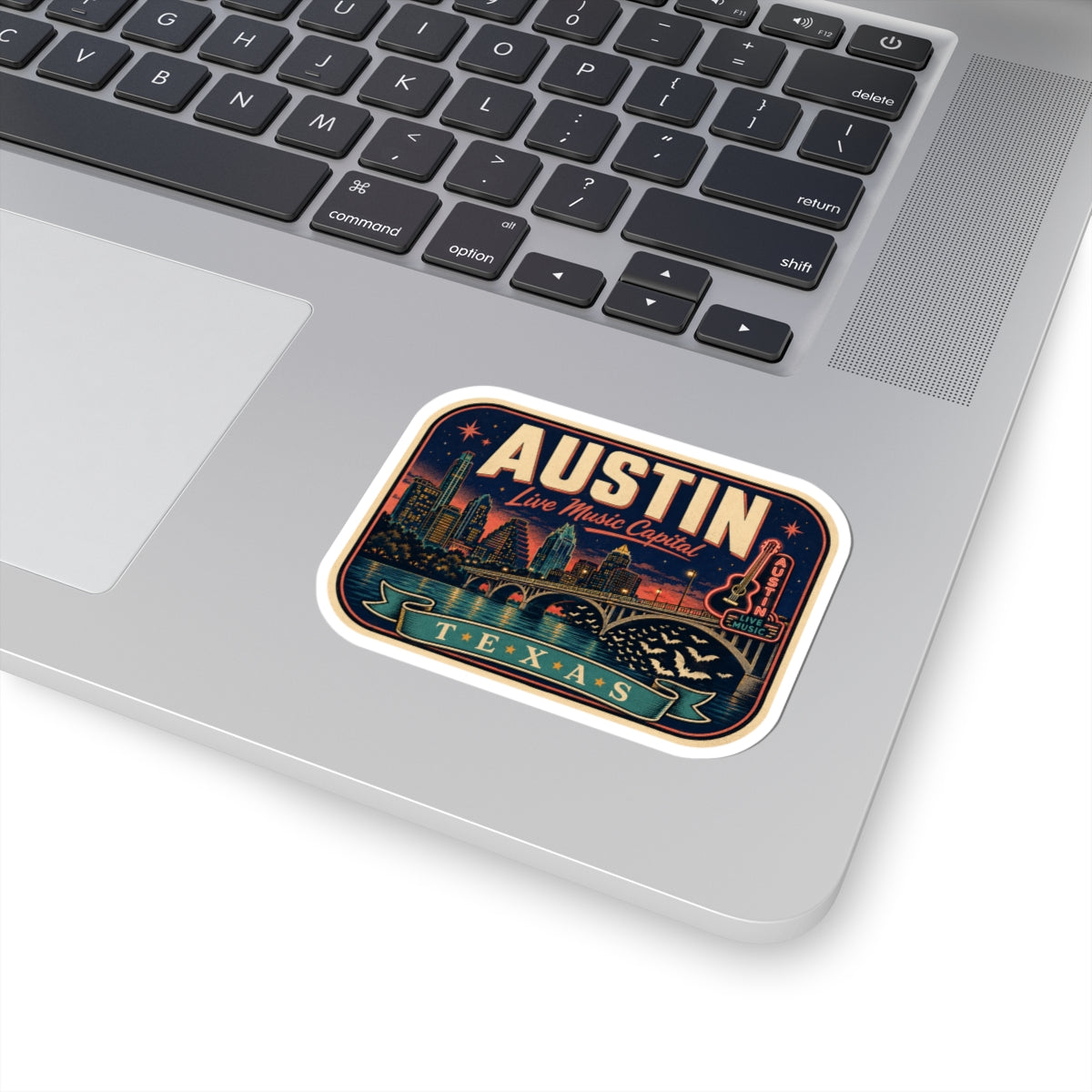 Austin luggage tag sticker on laptop, city skyline and “Live Music Capital” text