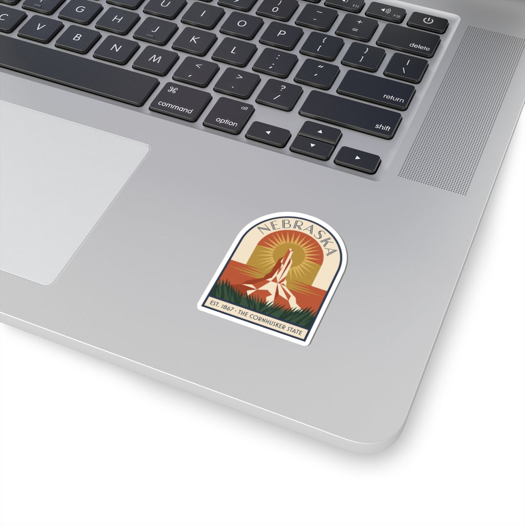 Art Deco Nebraska Chimney Rock vinyl sticker badge with sunburst and landscape scene