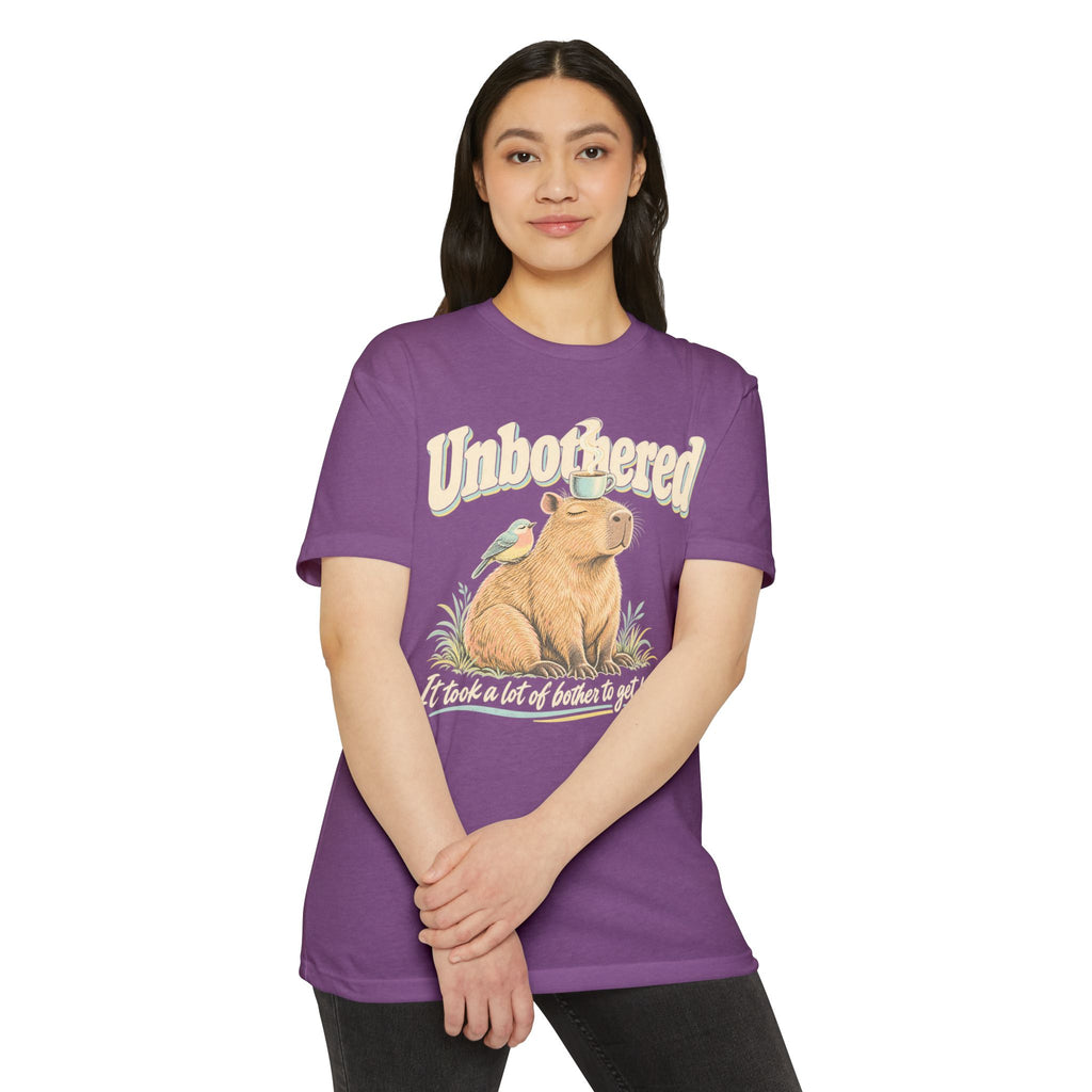 Purple crewneck graphic t-shirt with capybara and coffee-themed slogan