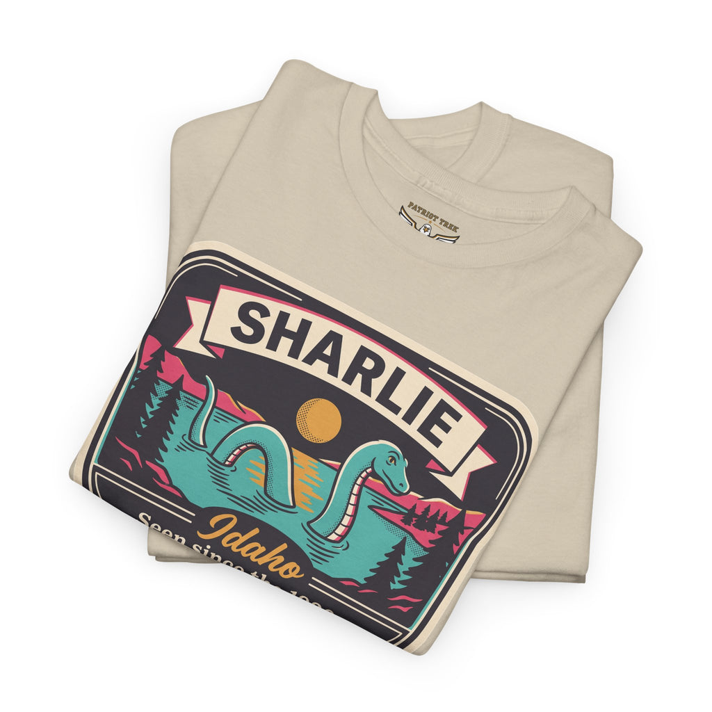 Beige T-shirt with large “Sharlie” mountain sunset patch graphic on front