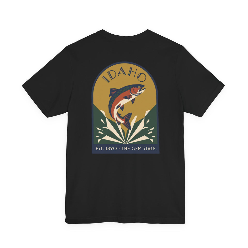 Black crewneck t-shirt with circular Idaho trout badge graphic and "EST. 1890 • THE GEM STATE" text.