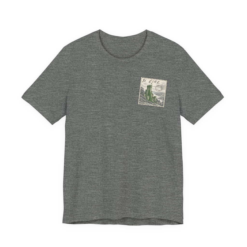 Dark gray travel t-shirt with small vintage postage-stamp castle graphic on chest