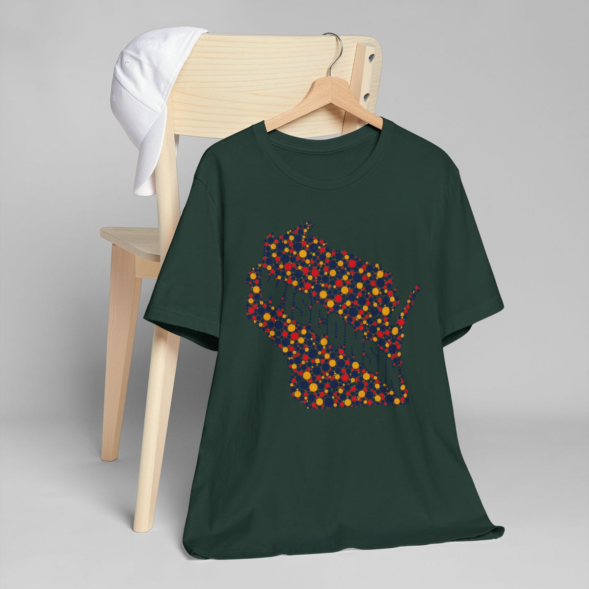 Dark green crew-neck T-shirt with colorful dot-pattern state graphic