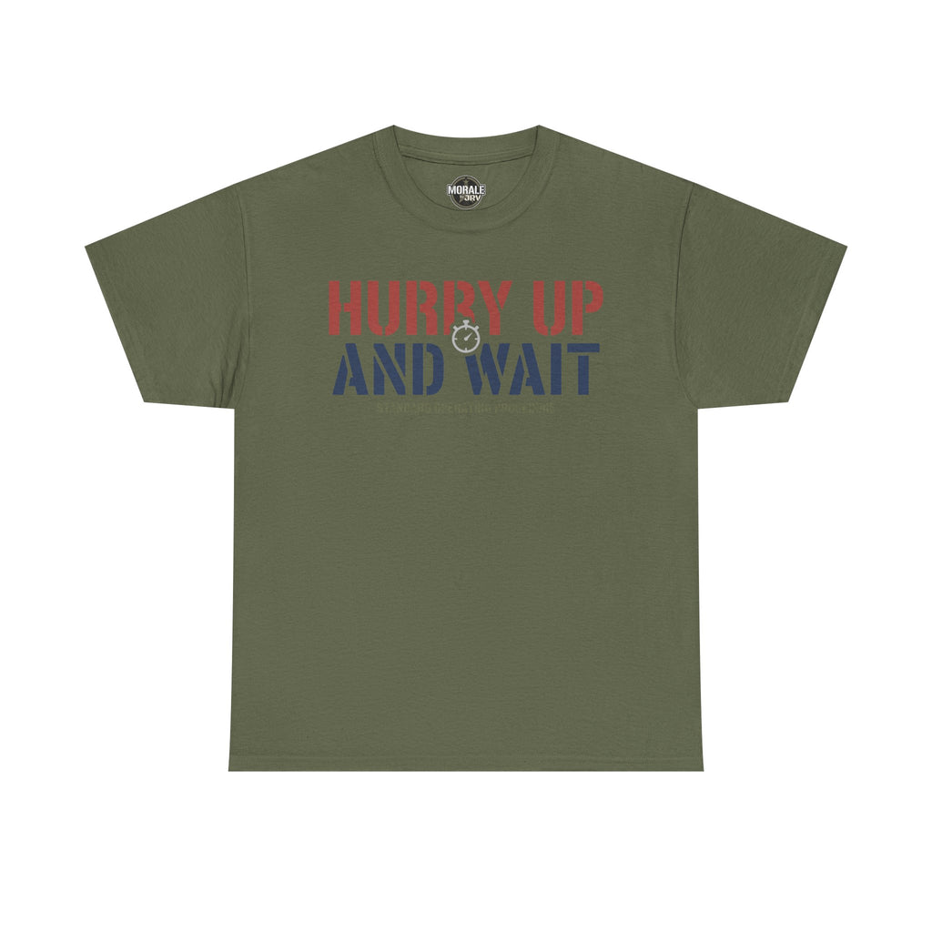 Military green T-shirt with 'HURRY UP AND WAIT' graphic and 'STANDARD OPERATING PROCEDURE' text