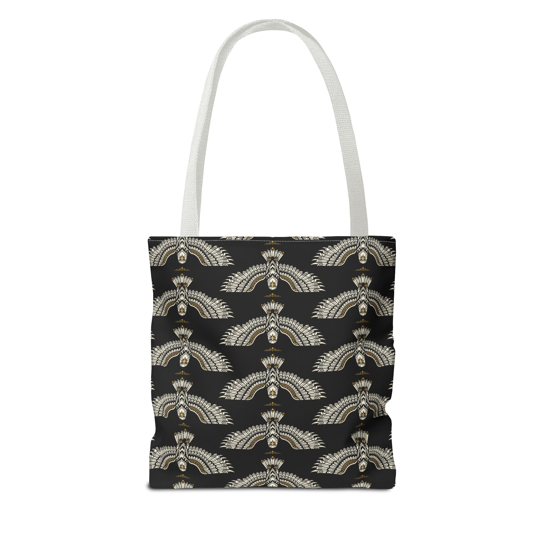 Tote bag with black fabric and repeating winged scarab pattern, white handles