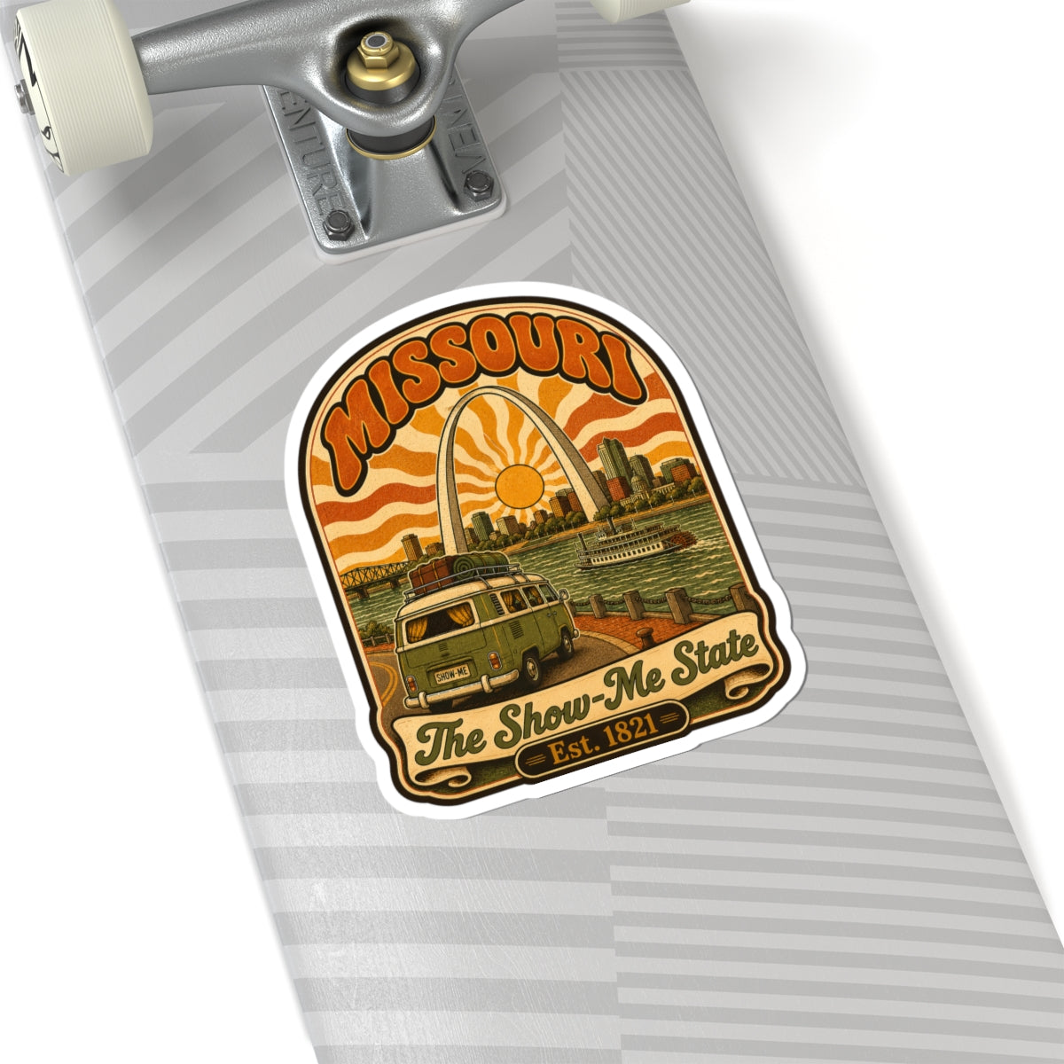 Missouri retro roadtrip sticker on laptop trackpad, arch sun, bus, riverboat, “Est. 1821”