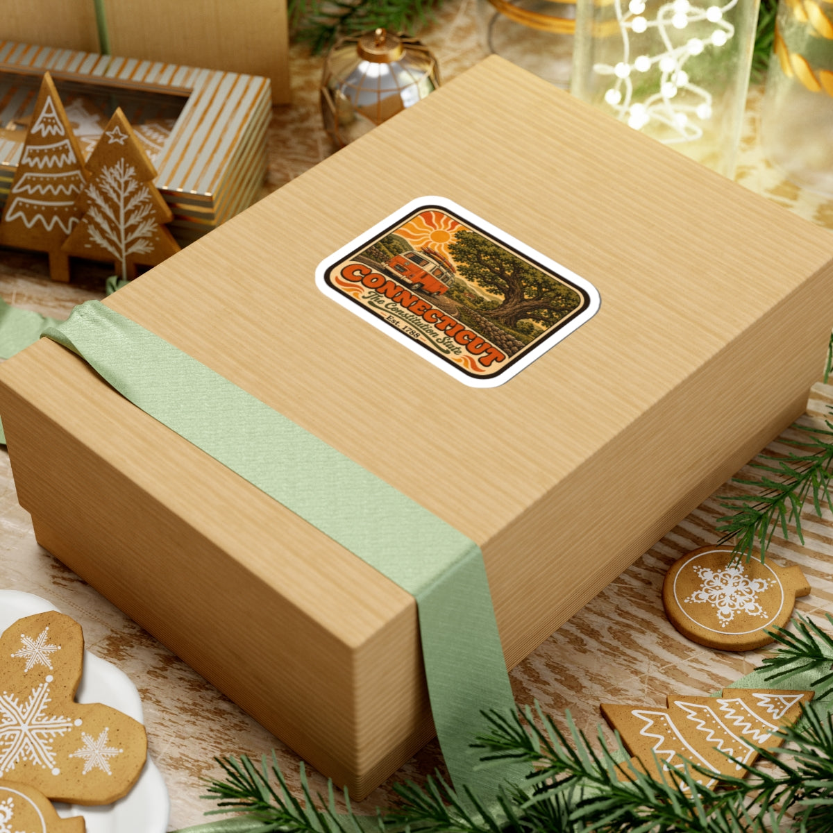 Connecticut vintage camper van sticker on a wrapped gift box with green ribbon.