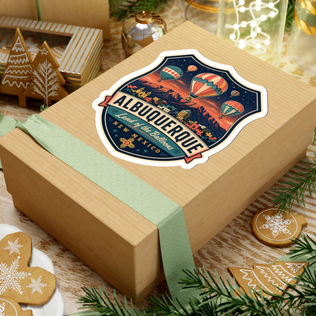 Albuquerque luggage tag sticker on a gift box, showing hot air balloons and New Mexico