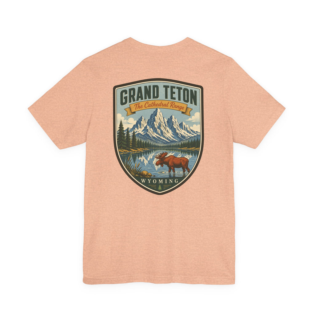 Heather peach crew-neck T-shirt with Grand Teton Wyoming scenic moose graphic center front.