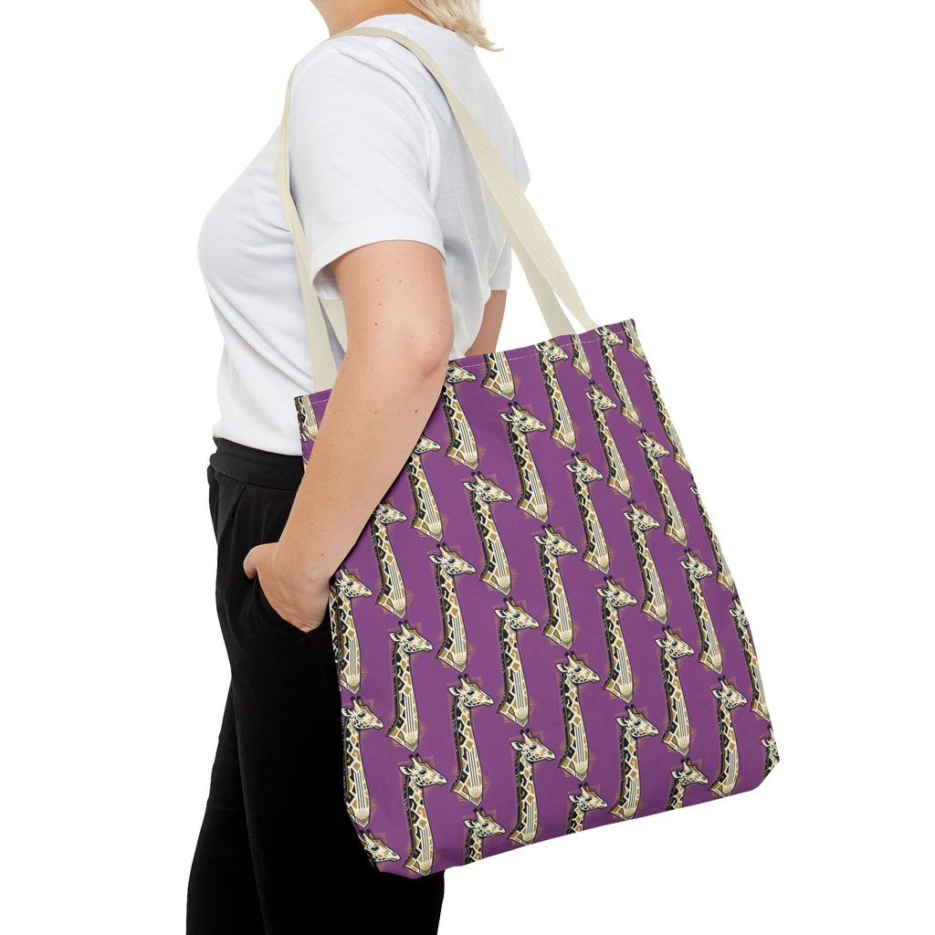 Purple tote bag with repeating saxophone pattern and navy handles, carried on shoulder.