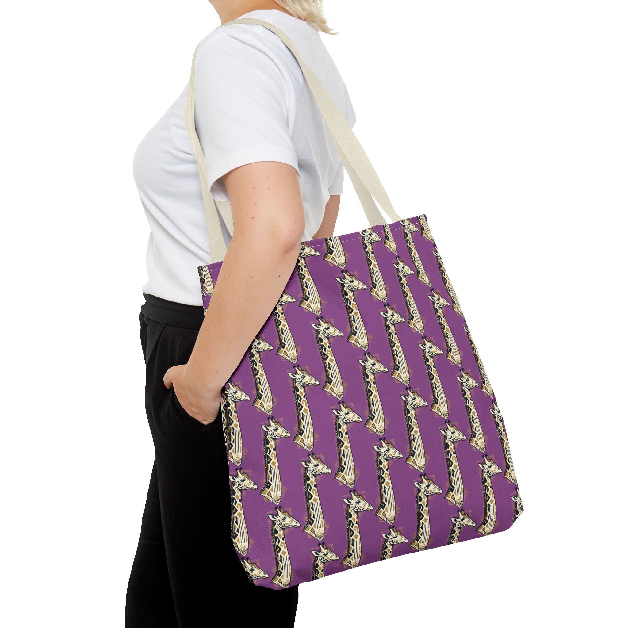 Purple tote bag with repeating saxophone pattern and navy handles, carried on shoulder.