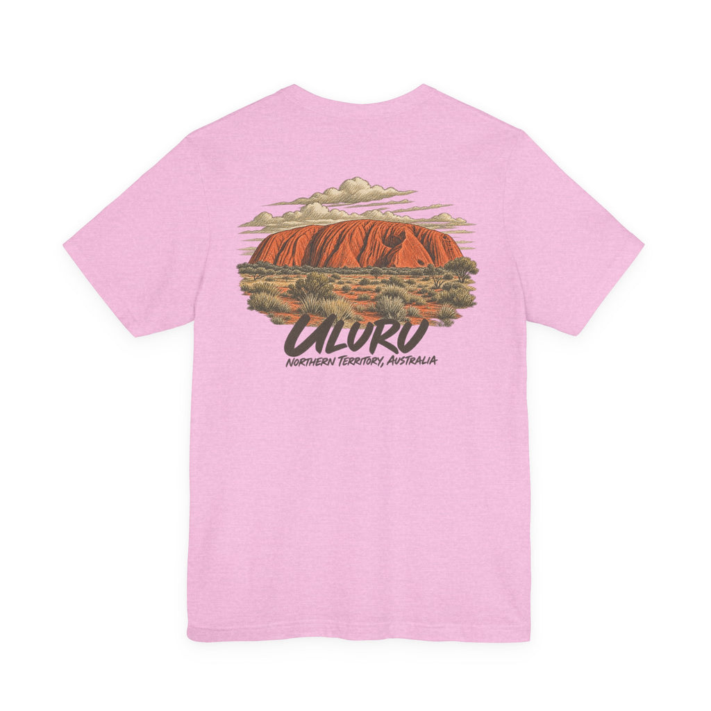Pink travel T-shirt with large Uluru landscape graphic centered on the front