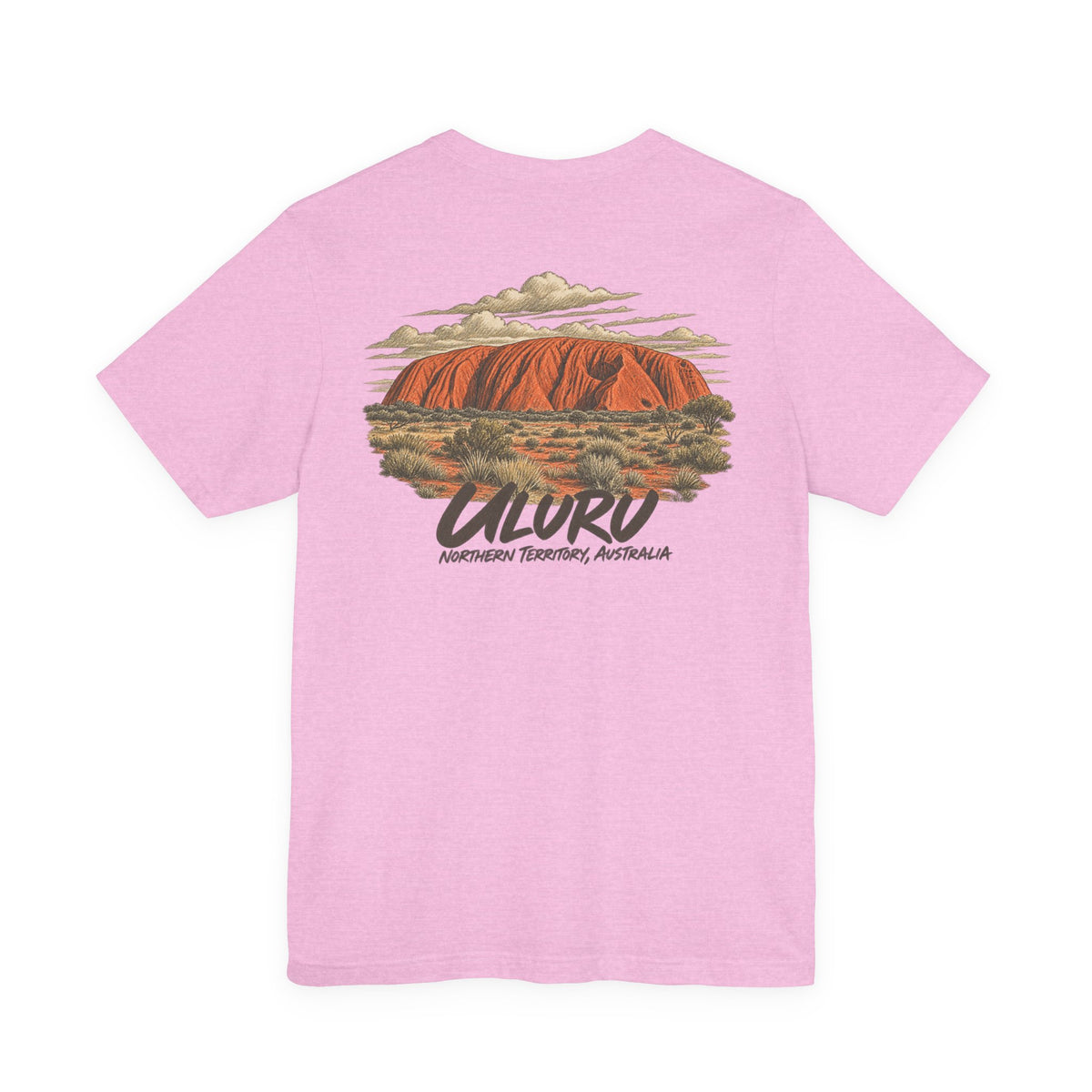 Pink travel T-shirt with large Uluru landscape graphic centered on the front