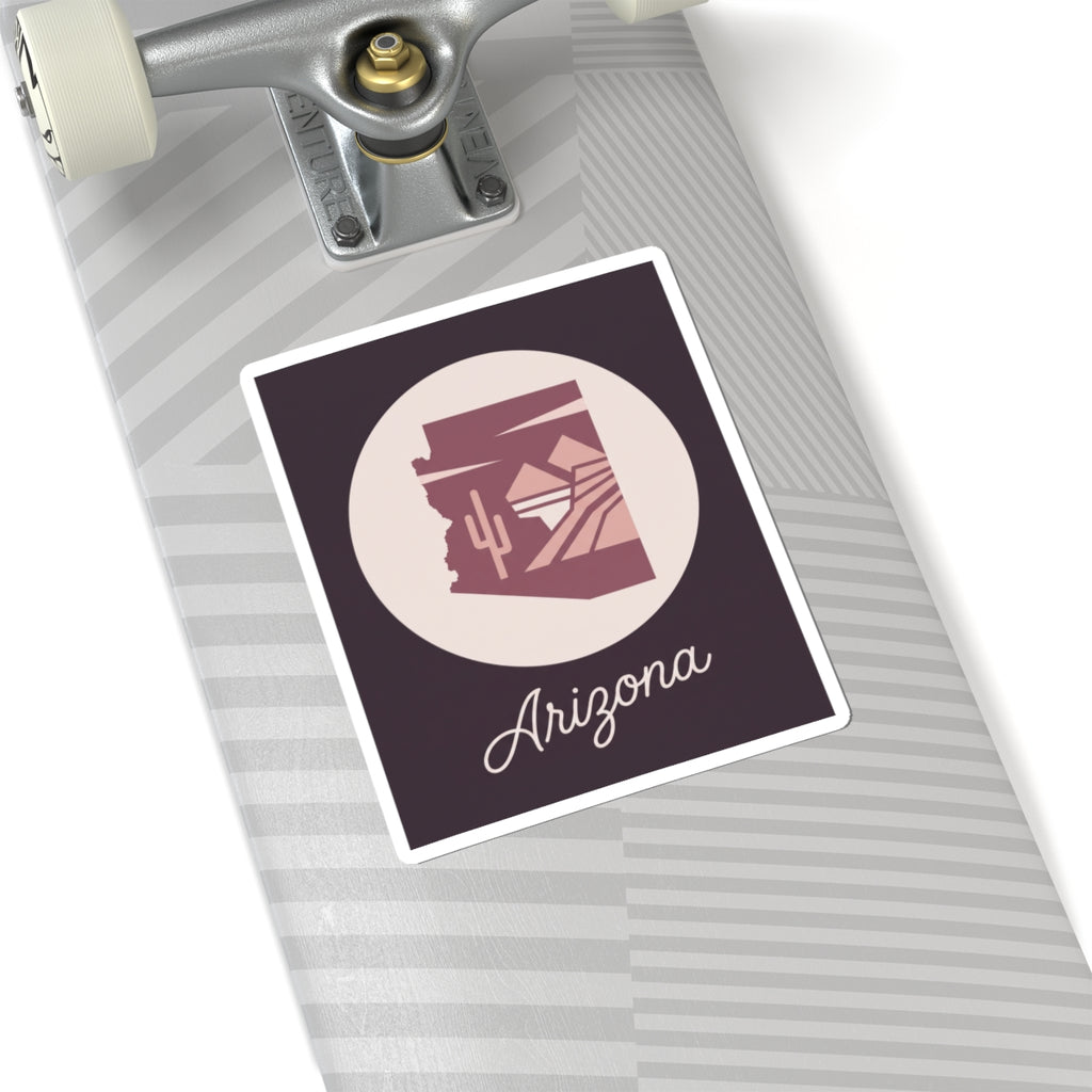 Mauve Arizona state silhouette vinyl sticker on white backing with cream circle and 'Arizona'