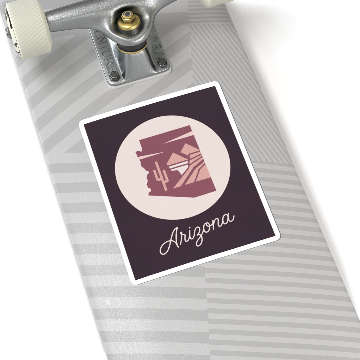 Mauve Arizona state silhouette vinyl sticker on white backing with cream circle and 'Arizona'