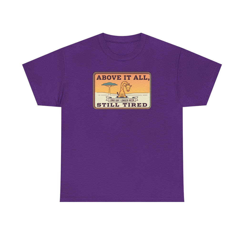 Purple short-sleeve crewneck tee with chest “Above It All, Still Tired” graphic badge.